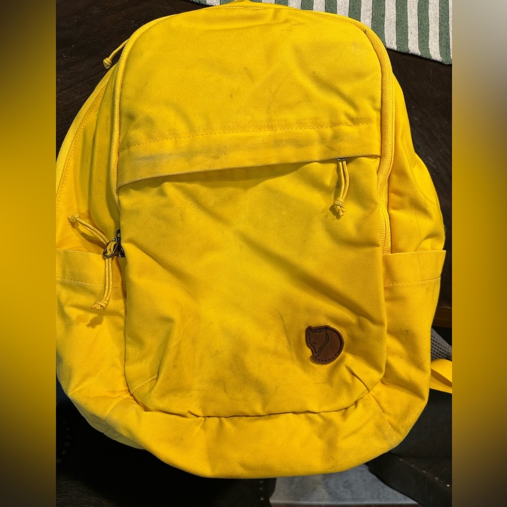Raven backpack 20L yellow. Used with some marks but no rips.